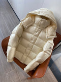 Moncler long cream puffer jacket with hood, front zip and snap buttons