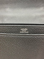 Leather satchel stamp reading "HERMES PARIS" and "MADE IN FRANCE"