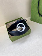 Gucci leather belt in box, navy strap with silver GG logo buckle