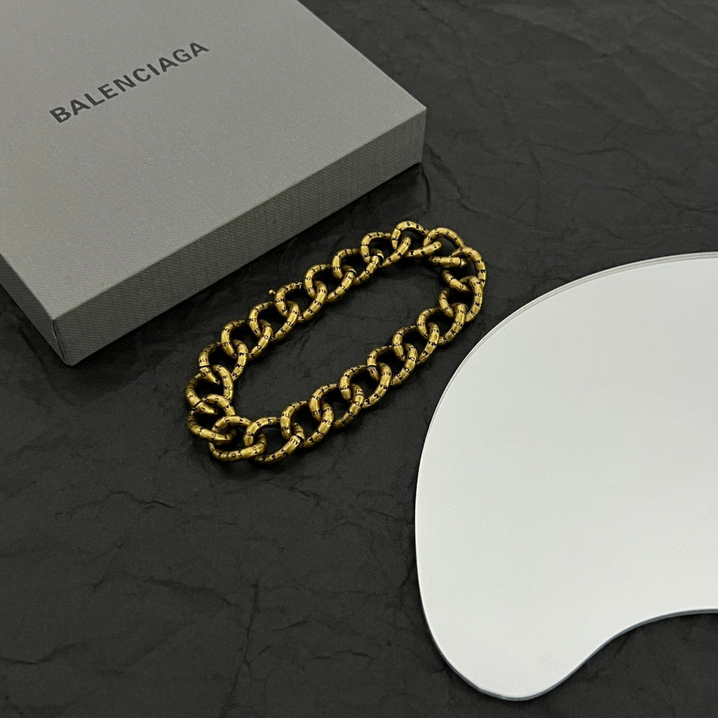 Balenciaga gold-tone chain bracelet with chunky links and BALENCIAGA logo plate