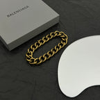 Balenciaga gold-tone chain bracelet with chunky links and BALENCIAGA logo plate