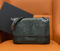 Dark green leather crossbody bag with YSL logo and chain shoulder strap