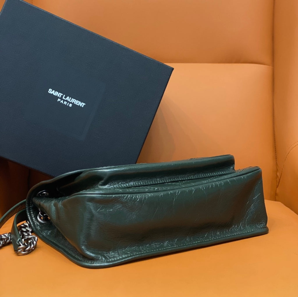 Dark green leather small bag with strap and stitched flap
