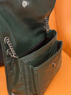 Dark green leather crossbody bag with zipper pocket and chain strap