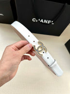Chanel belt in white leather with round blue crystal CC buckle and punched holes