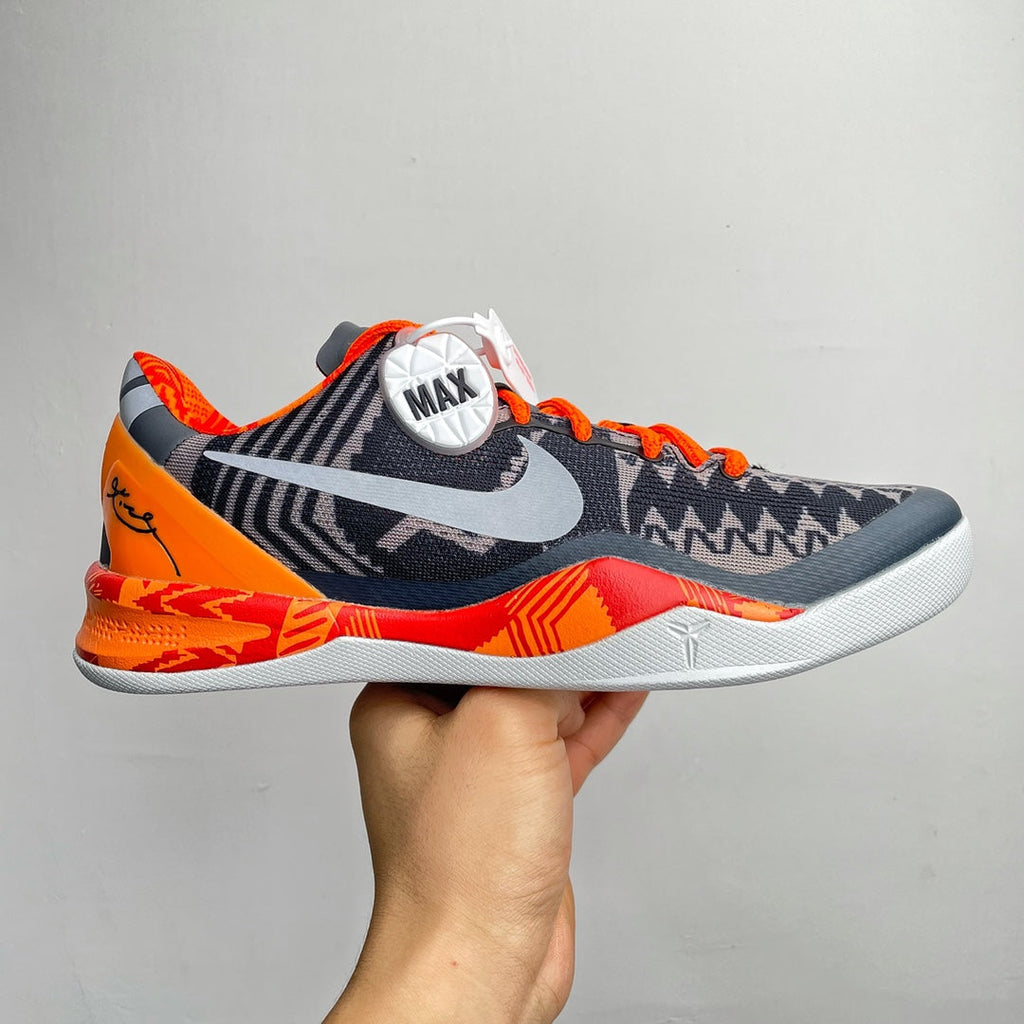 Basketball shoes, dark navy with orange accents and white midsole