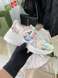 Gucci unisex sneakers, white with multicolor logo print and chunky white sole