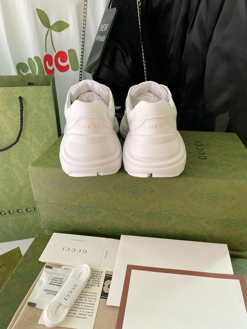 White Gucci sneakers rear view with heel tab logo