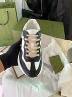 Gucci unisex sneakers, black and white, beige lace-up, low-profile chunky sole