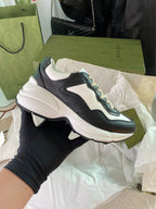 Gucci unisex sneakers, black and white with blue accents, chunky sole, lace-up