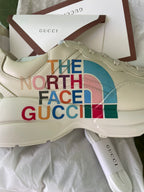 Beige Gucci x The North Face sneakers, lace-up with colorful 'The North Face' side print