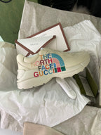 Beige Gucci x The North Face chunky sneakers on tissue paper, side logo and laces