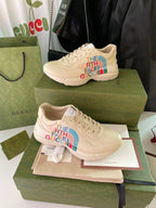 Beige Gucci x The North Face lace-up sneakers, colorful side 'The North Face Gucci' print