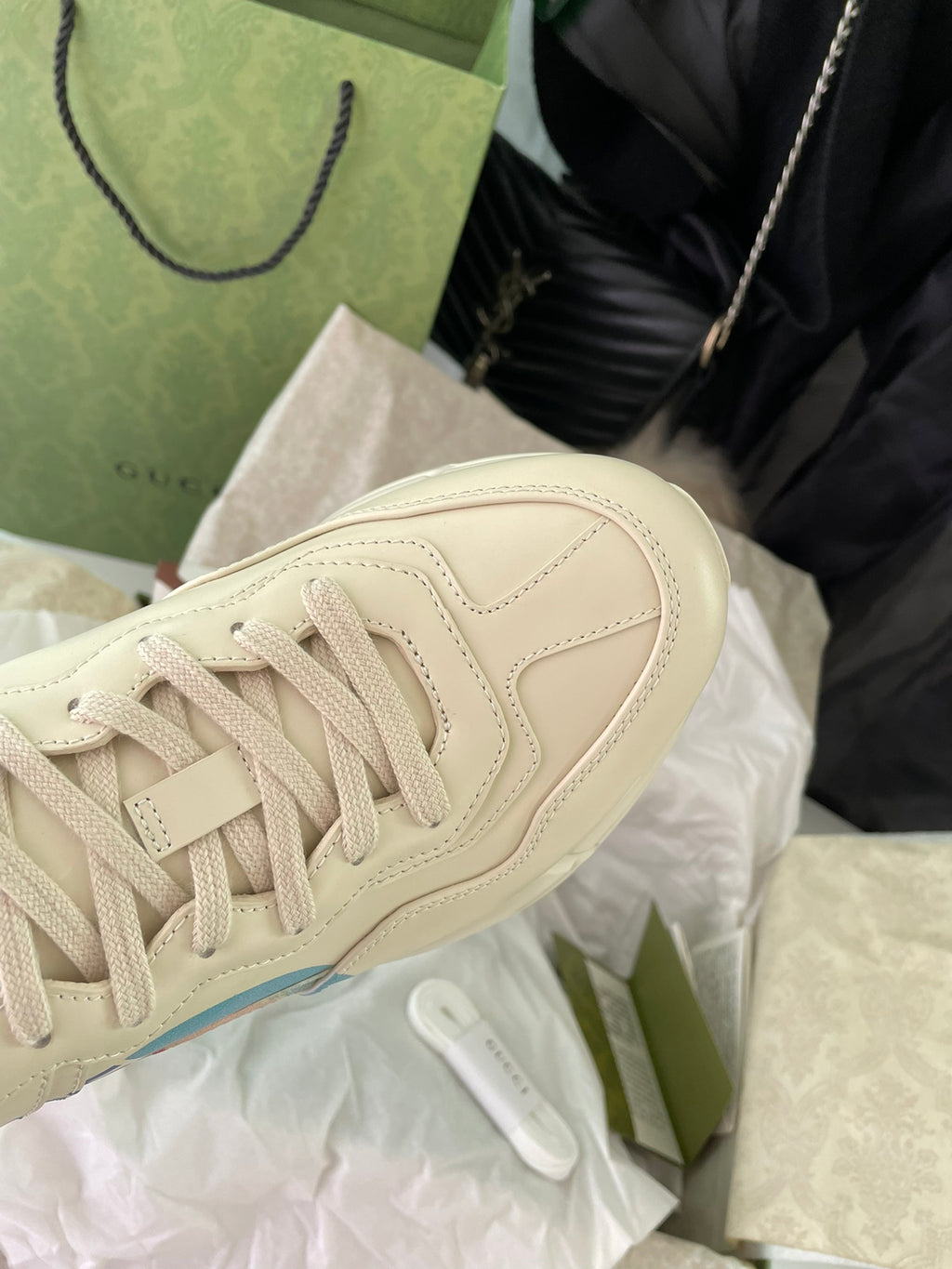 Beige Gucci lace-up sneakers, textured panels and cushioned sole detail