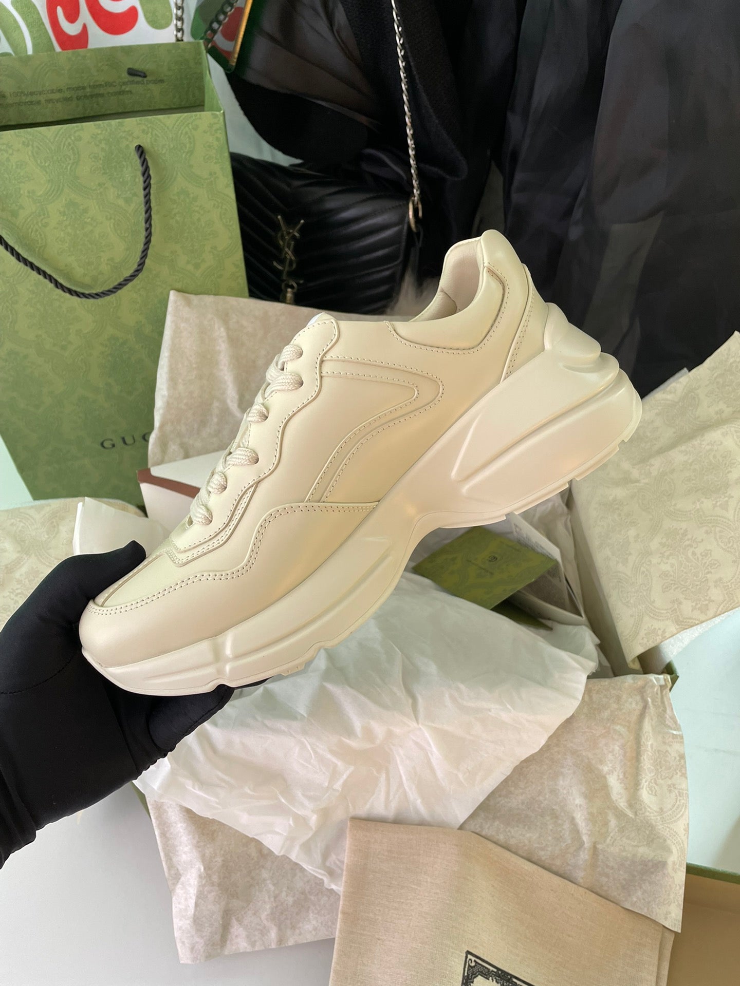 Cream Gucci running-style sneakers with stitched side panels