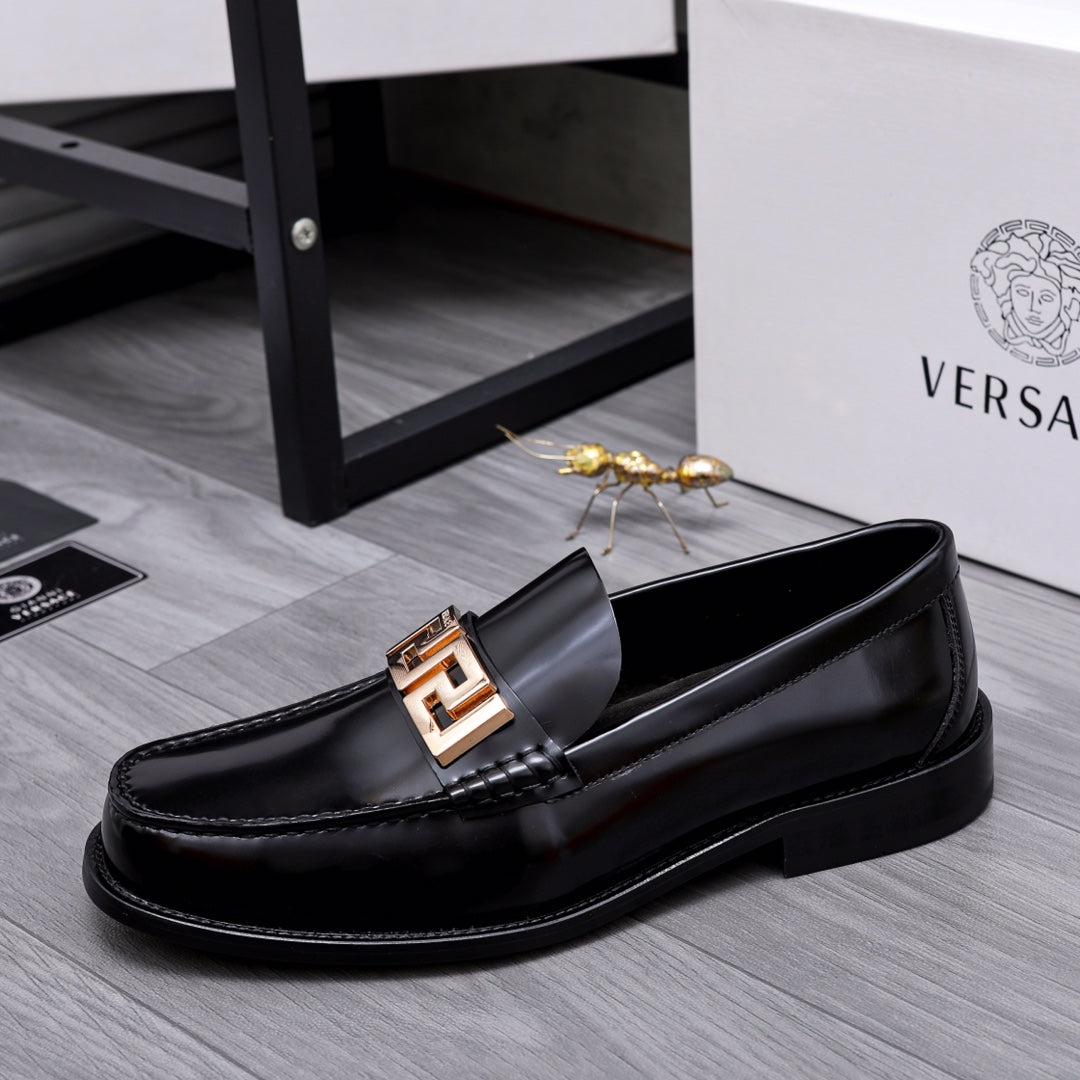 Luxury shoes Versace black leather loafer with gold-tone Greca buckle on vamp