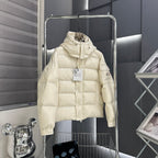 Moncler long puffer jacket front view, light cream, quilted with logo patches