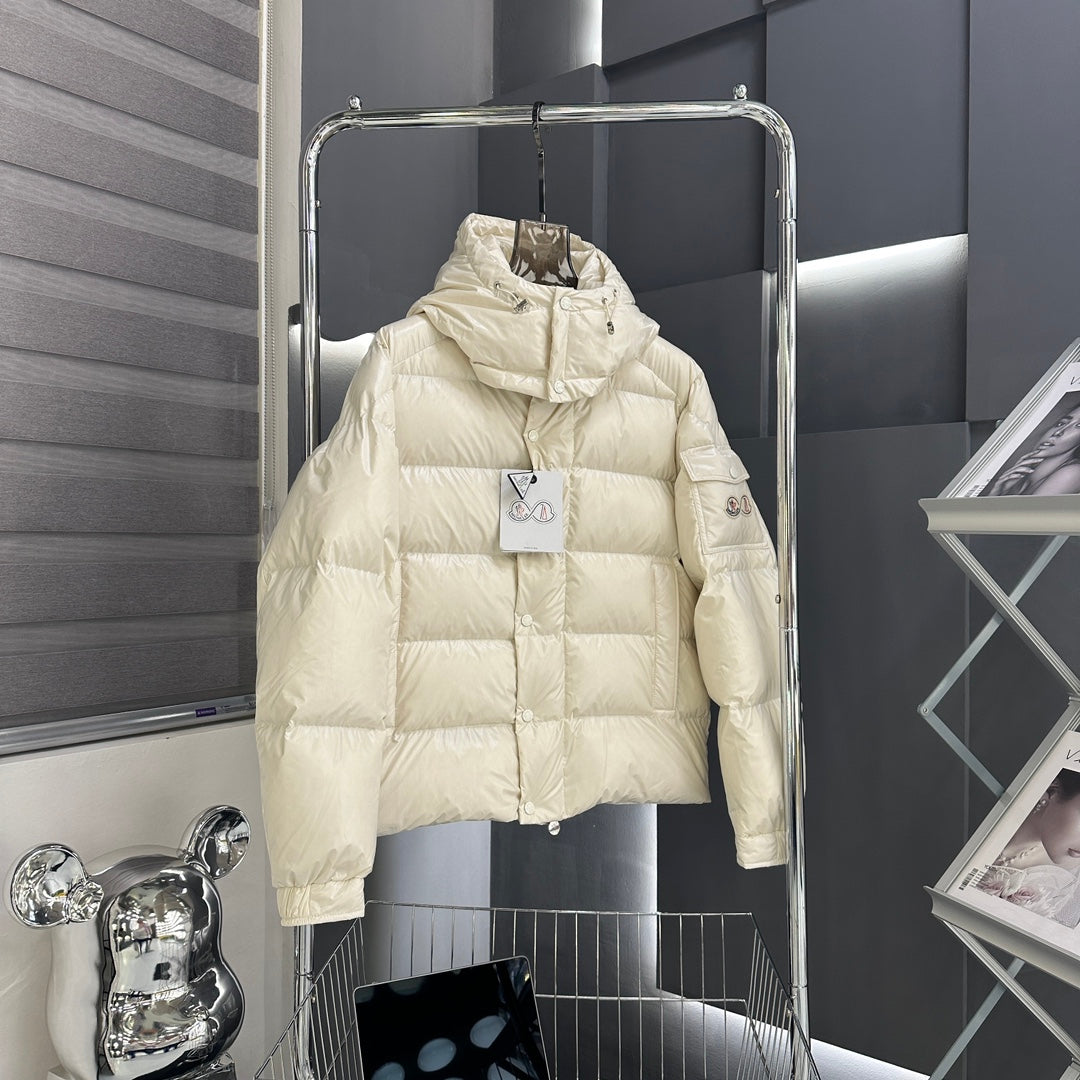 Moncler long puffer jacket front view, light cream, quilted with logo patches