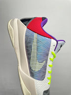 Basketball shoes angled view with blue print panel, neon green laces, and Nike side logo