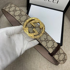 Gucci belt with GG monogram canvas and gold-tone G buckle, brown leather trim.