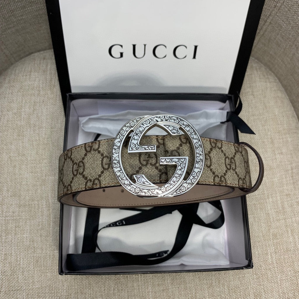 Gucci GG canvas belt laid in box with silver-toned G buckle