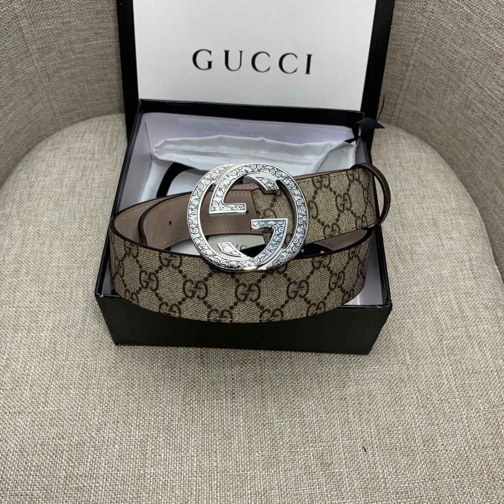Gucci GG canvas belt with silver G buckle and dark brown leather strap