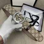 Gucci GG canvas belt with dark brown leather ends and G buckle