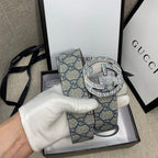 Gucci belt with blue GG canvas strap and silver-tone logo buckle, lifted
