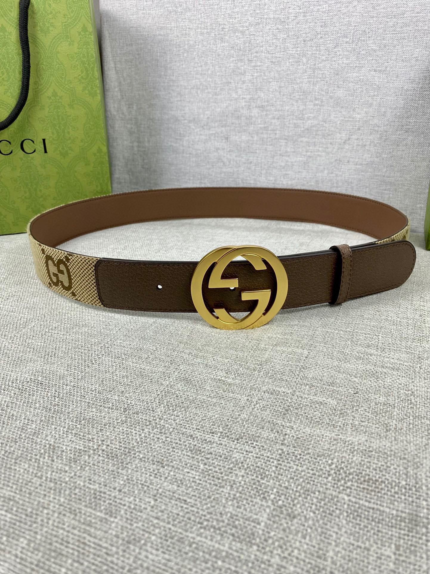 Brown leather belt with GG canvas side and gold-tone double G buckle