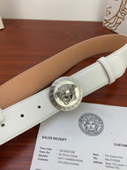 White leather belt with silver Medusa coin buckle and tan leather underside