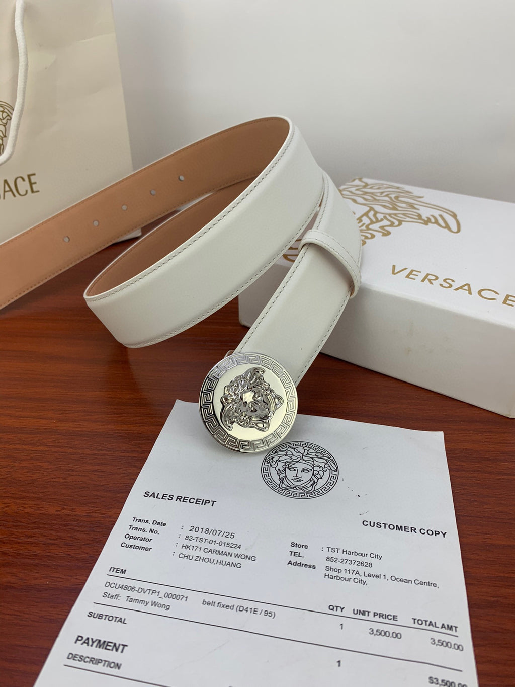 White leather belt with silver Medusa coin buckle and tan inner leather