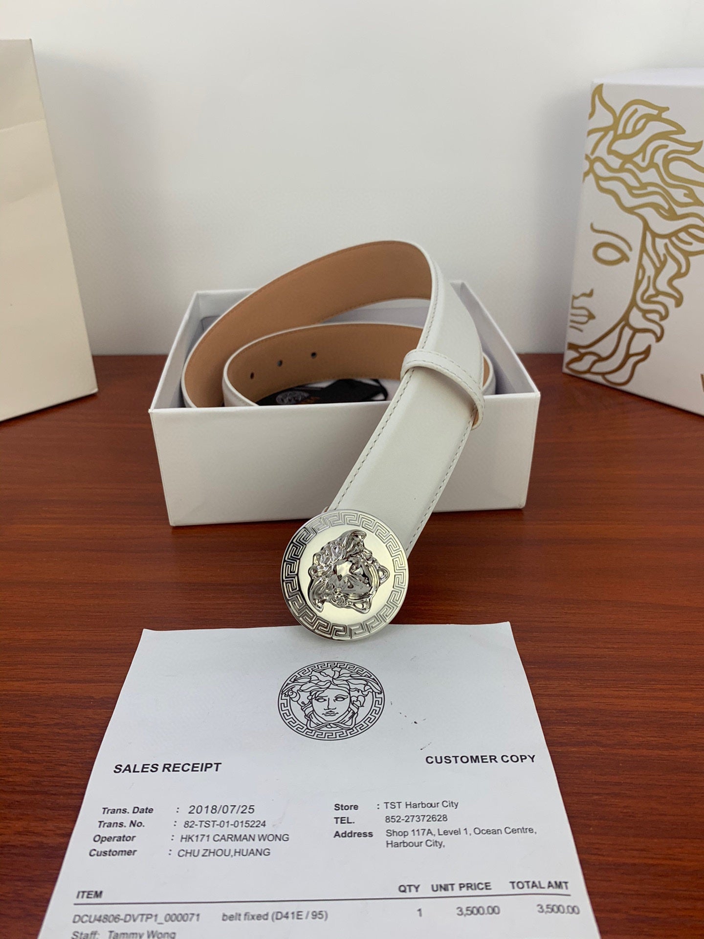 White leather belt with silver Medusa coin buckle and tan inner leather
