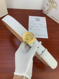 White leather belt with gold Medusa coin buckle and single prong holes