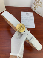 White leather belt with gold Medusa coin buckle and single prong holes