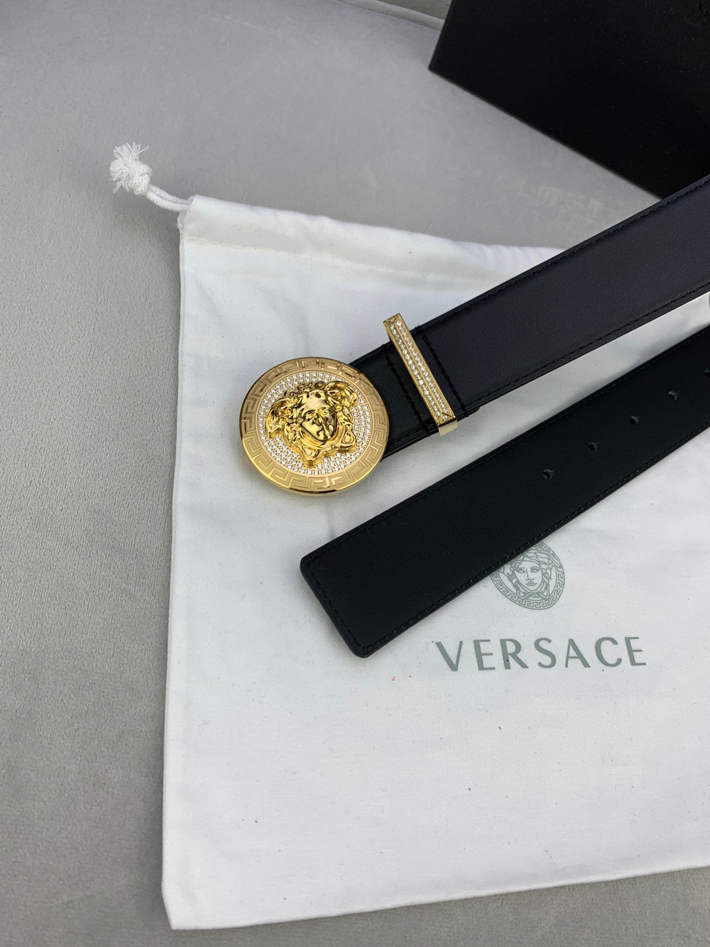 Versace black leather belt with gold medallion buckle and strap end