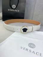 Versace belt in white leather with gold round buckle and black Medusa emblem.