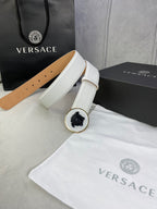 Versace belt in white leather with round Medusa buckle and fabric dust bag.
