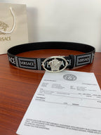 Versace belt on box: black strap with silver oval buckle and logo detail