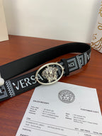 Versace belt laid flat: black leather strap with silver oval buckle