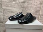 Black croc-embossed slide sandals with BB logo, side view