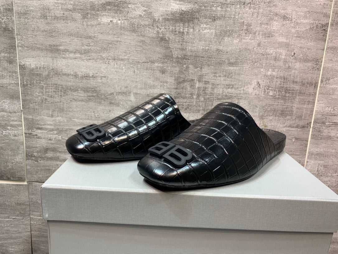 Black croc-embossed slide sandals with BB logo, side view