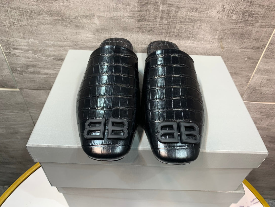 Black croc-embossed slide sandals with BB logo strap detail