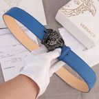Versace belt in blue leather with silver lion-head buckle and tan interior lining.
