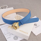 Versace belt in blue leather with gold lion-head buckle and tan inner lining.