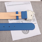 Versace belt in blue leather with tan underside, belt holes, and end tab.