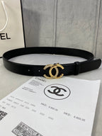 Black leather belt with gold-tone CC buckle and stud holes