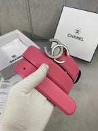 Chanel belt with pink leather strap, black lining, gold CC buckle with rhinestones