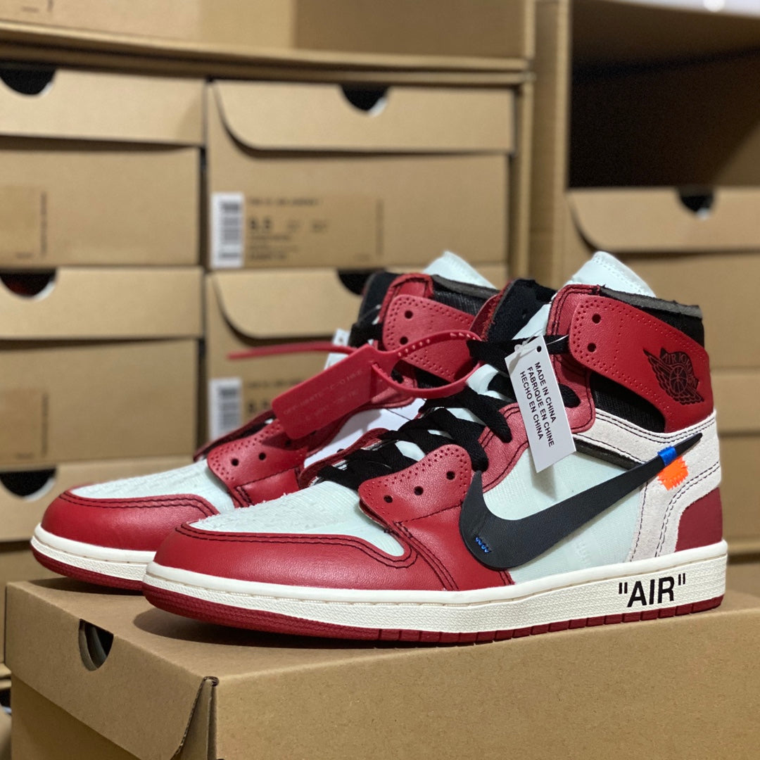 Red and white high-top sneakers with black laces and blue Swoosh