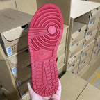 Red high-top sneaker outsole with circular tread pattern