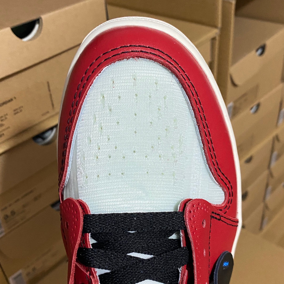 Red high-top sneaker tongue and collar with black lace and white interior lining